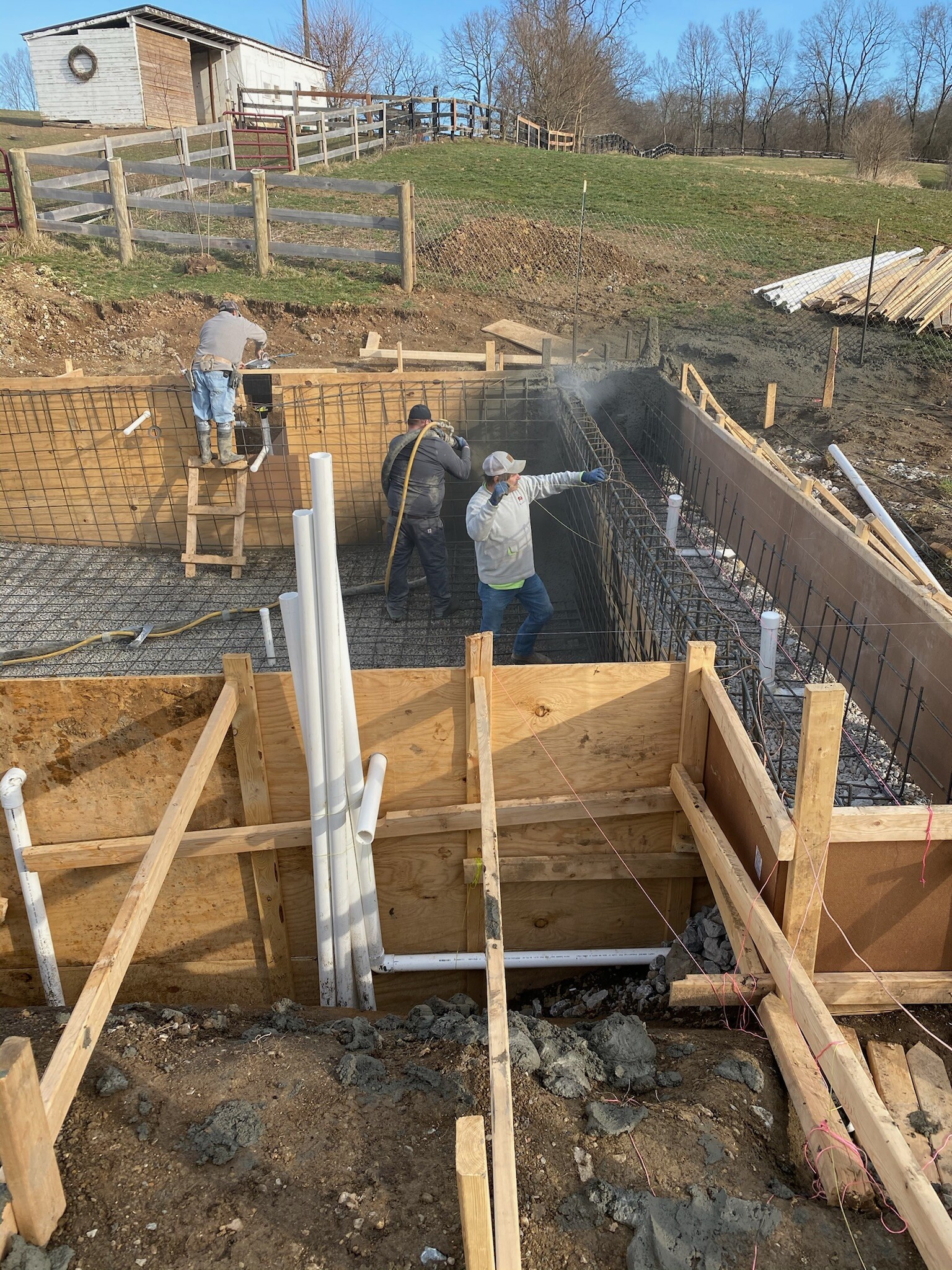 Pool with patio and landscaping